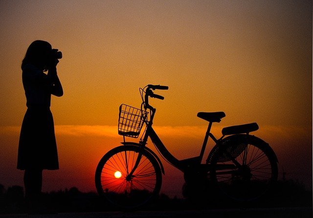 Seeking insights through a camera at sunset after biking